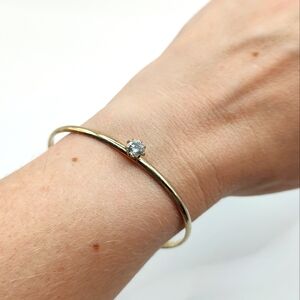 Simple Gold Bangle Bracelet with Silver Diamond-like Accent